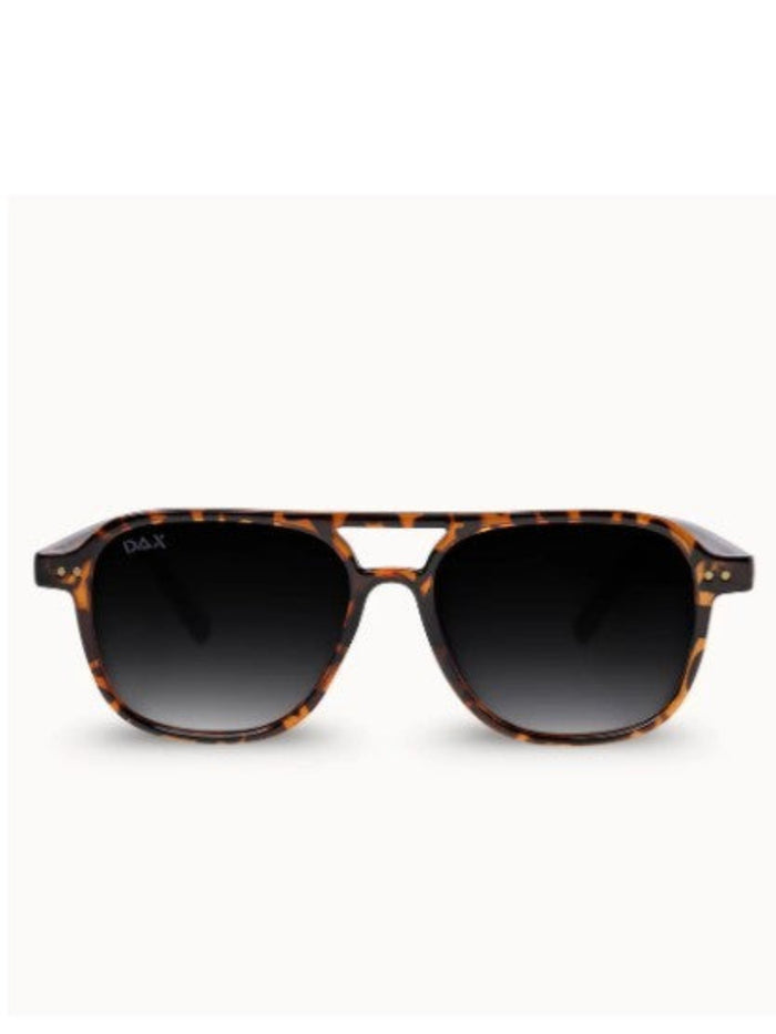 A pair of D&X sunglasses with a classic aviator-style frame in a brown and black tortoiseshell pattern, featuring dark gradient lenses.