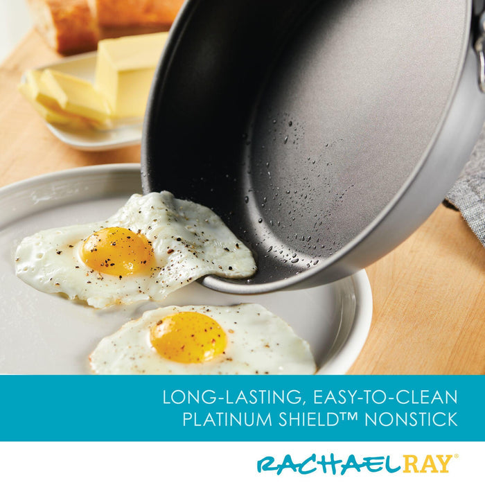 The 10-Piece Hard Anodized Nonstick Set slides two eggs onto a plate.