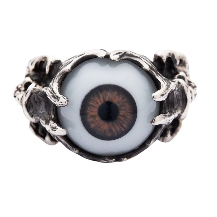 Top-down view of the brown eyeball ring, showing the realistic brown iris held by sterling silver bony claws.