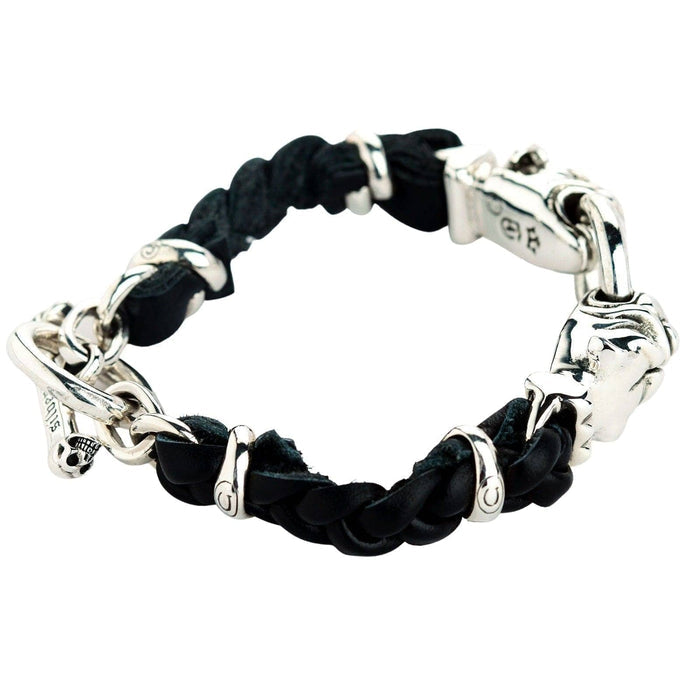 A side view of the entire silver bulldog and leather bracelet.