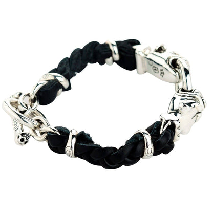 A side view of the entire silver bulldog and leather bracelet.
