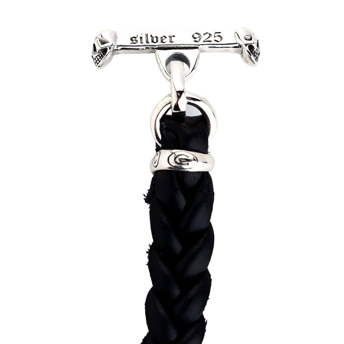 Detail shot of the T-bar clasp showing the skull ends and the 'silver 925' hallmark stamp.