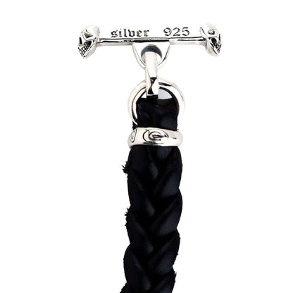 Detail shot of the T-bar clasp showing the skull ends and the 'silver 925' hallmark stamp.