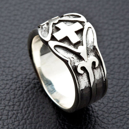 Artisan crafted silver ring side view on dark background