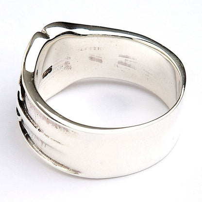 Back view of silver ring showing solid band construction