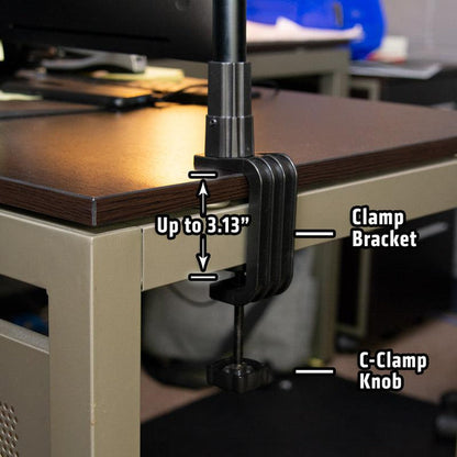 The Clamp for Converting Remarkable Creator™ Stands features a sturdy metal base that secures poles to wooden desks up to 3.13 thick, offering lightweight mounting near visible computer equipment as part of the Remarkable Creator Series.