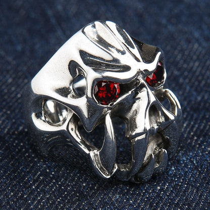 An angled view of the gothic biker ring, highlighting the huge polished fangs and red eyes.