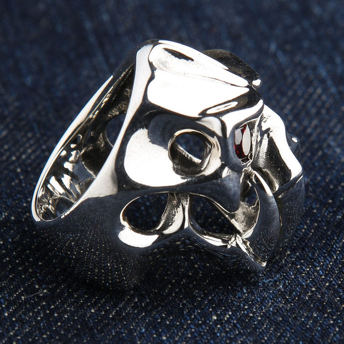A detailed shot of the polished silver fang ring, focusing on the brilliant shine of the fangs.