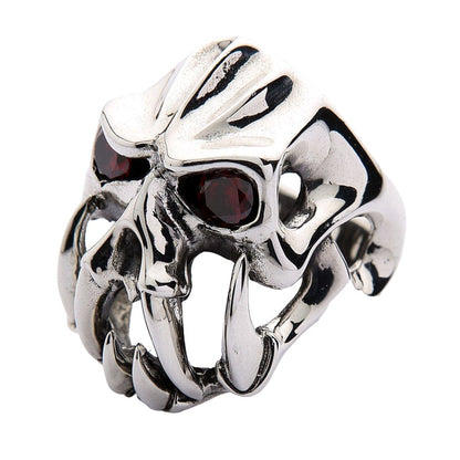 The abstract demon skull ring with large fangs, isolated on a white background.