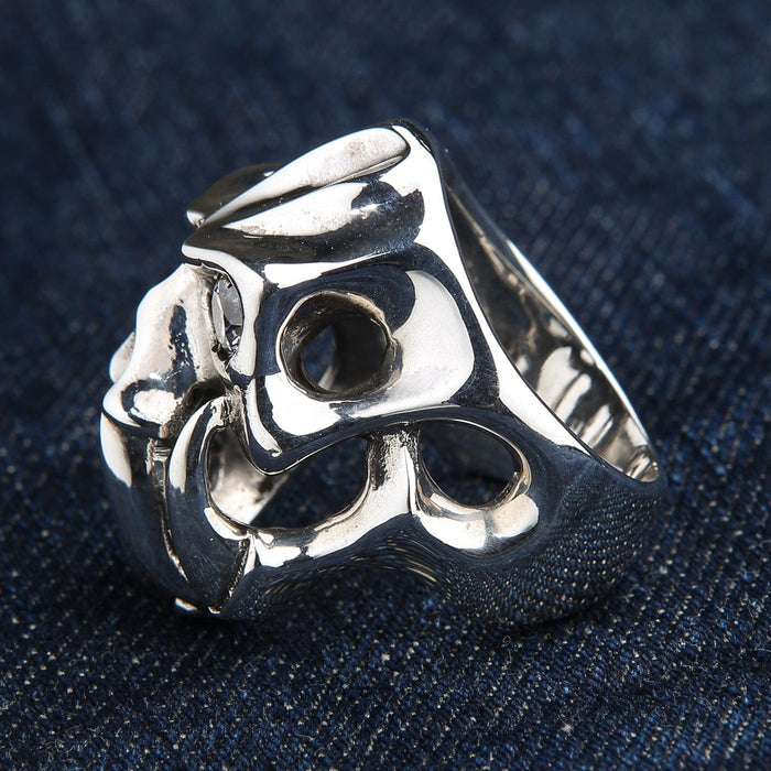 The other side of the openwork silver demon ring, showing its unique hollow design.