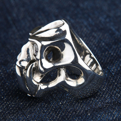 The other side of the openwork silver demon ring, showing its unique hollow design.
