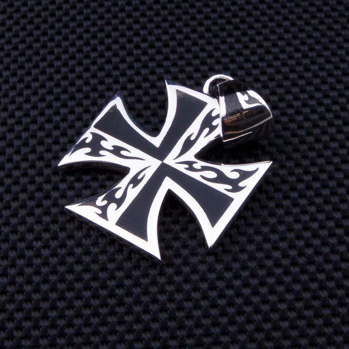 A men's flame cross pendant, highlighting its edgy and masculine tattoo-inspired aesthetic.
