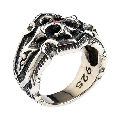 Angled view of heavy 23 gram sterling silver gothic ring showing smooth interior band and exterior scroll work