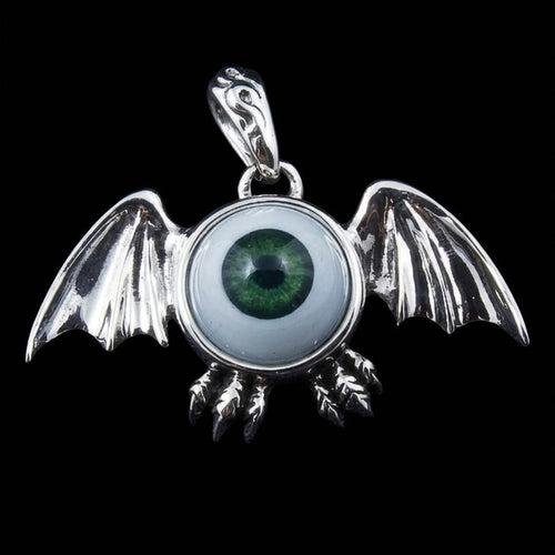 Sterling silver gothic bat pendant featuring a vibrant green eyeball, detailed wings, and claws, shot front-on against a black background