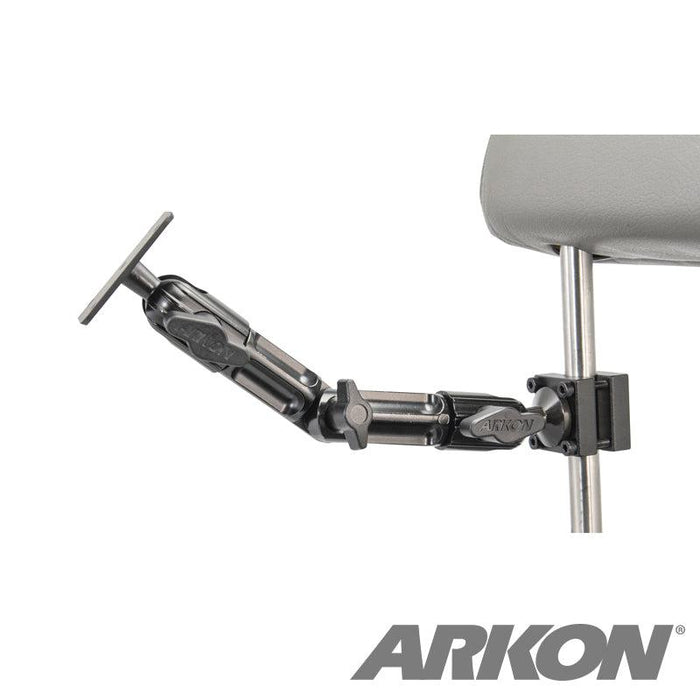 The Heavy Duty Aluminum Car Headrest Mount with 4-Hole AMPS Head attaches to a metal chair frame, offering an adjustable black mounting arm ideal for backseat entertainment. The ARKON logo appears in the bottom right corner.