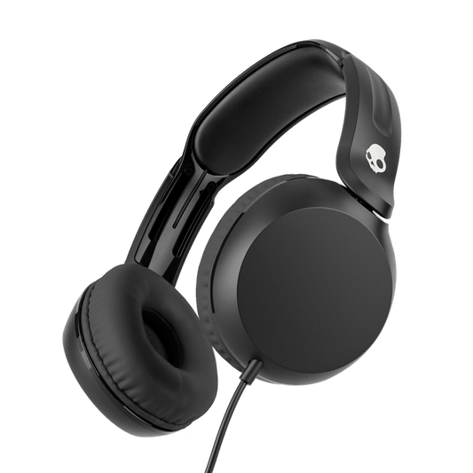 Black over-ear wired headphones with cushioned ear pads and a padded headband, shown at an angle on a solid black background. A small white skull logo is visible on the headband. |True Black