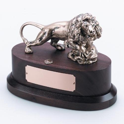 LION STATUETTE ON WOOD BASE