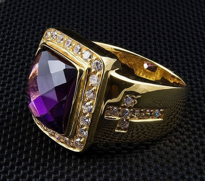 The gold amethyst ring with a diamond cross, highlighting the sparkle of the synthetic diamond accents.