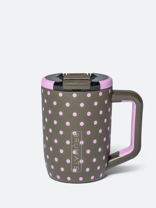 A gray insulated travel mug with pink polka dots, a pink handle, and a matching pink lid, shown on a light gray background.