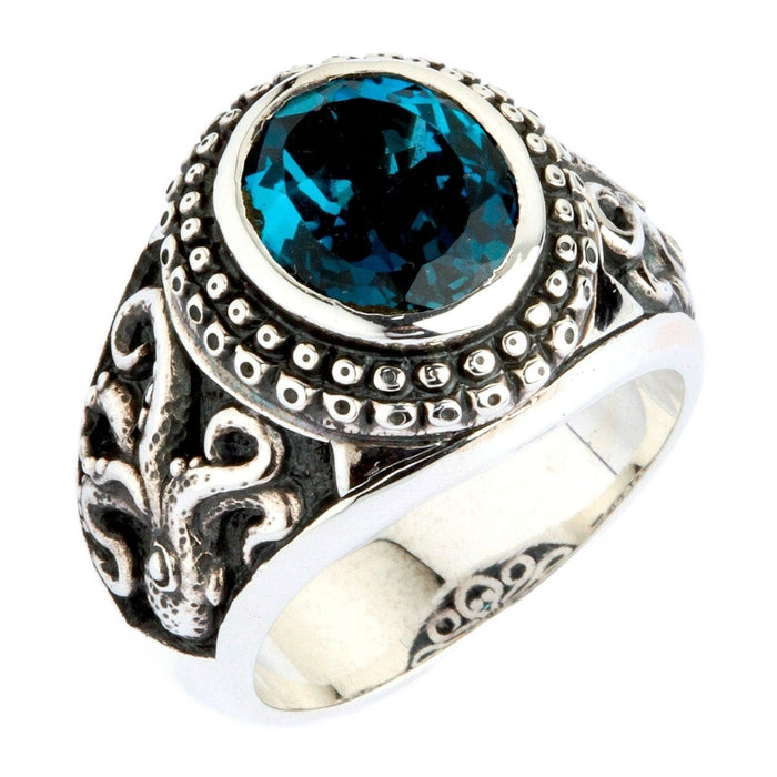 A men's ring featuring a genuine London Blue Topaz, set in a handcrafted octopus-themed silver band.