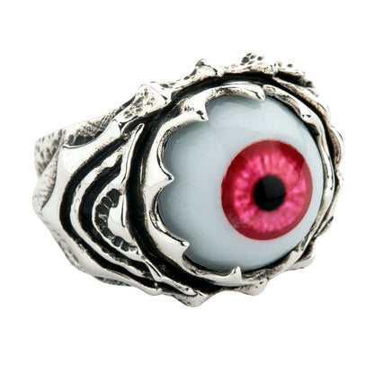 Angled close-up highlighting the textured .925 sterling silver claws gripping the 26mm polymer eye with a crimson iris.