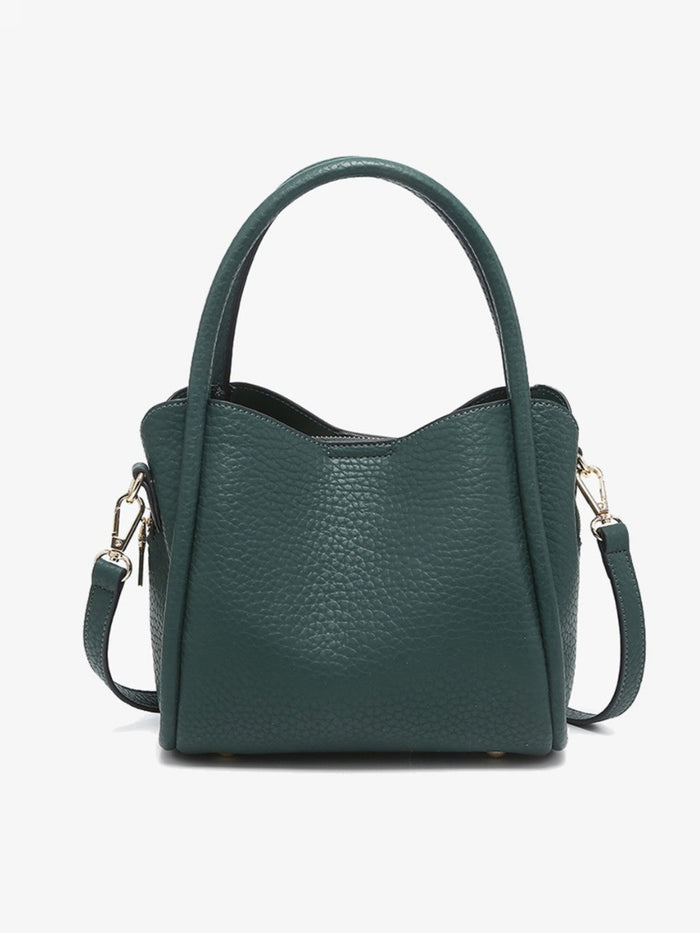A dark green pebbled leather handbag with a top handle, shoulder strap, and gold-tone hardware, shown against a plain white background.