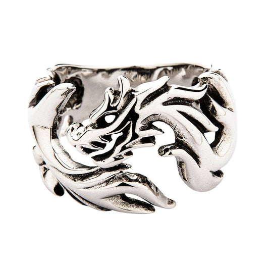 A men's solid sterling silver ring featuring a tribal flame wolf design in a bold, openwork style.
