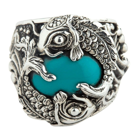 Front view of turquoise Japanese koi fish sterling silver men's ring showing detailed fish scales and blue-green stone