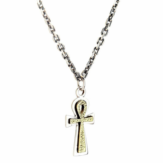 The sterling silver and brass Ankh pendant hanging from a silver chain.
